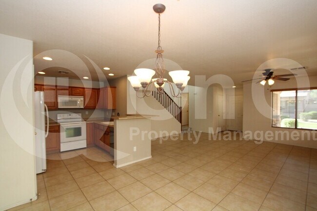 Building Photo - 5840 E Hoover Ave