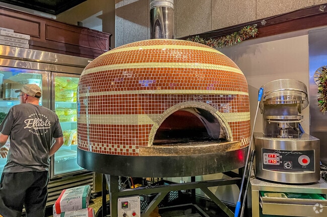 Enjoy a pizza from the wood-fire gill at Elliot's in Newark.