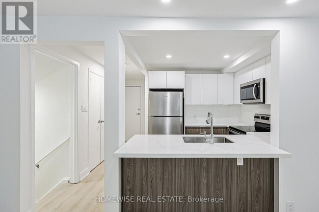 Building Photo - 100 Liberty St N