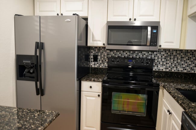 Foto del edificio - 9311 Orange Grove Dr