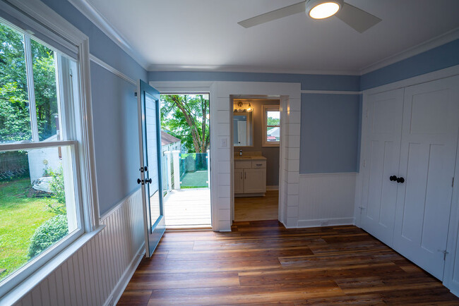 one of two master bedrooms with private balcony - 610 Montrose Avenue Apt B