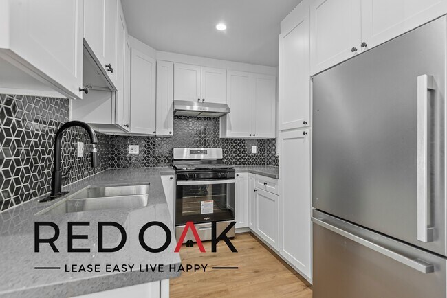 Foto del edificio - Top Floor Two Bedroom with Sunlit Spaces, ...