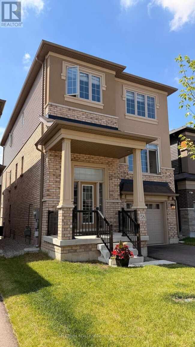 Photo du bâtiment - 58 George Brier Dr W