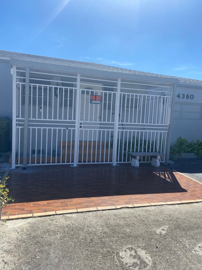 Front of home efficiency private entry right side with ring - 4360 SW 2nd Ter