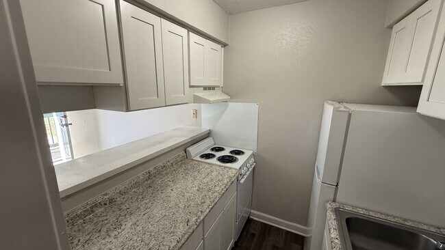 Foto del edificio - Pepper Tree Apartments