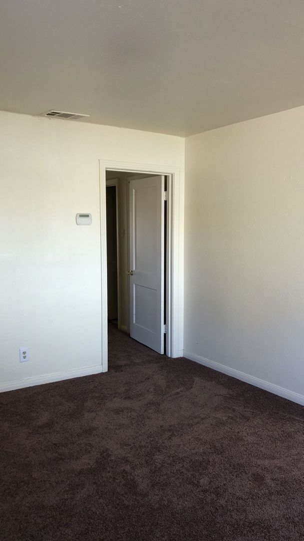 Building Photo - NEW CARPET & PAINT - AVAILABLE NOW!