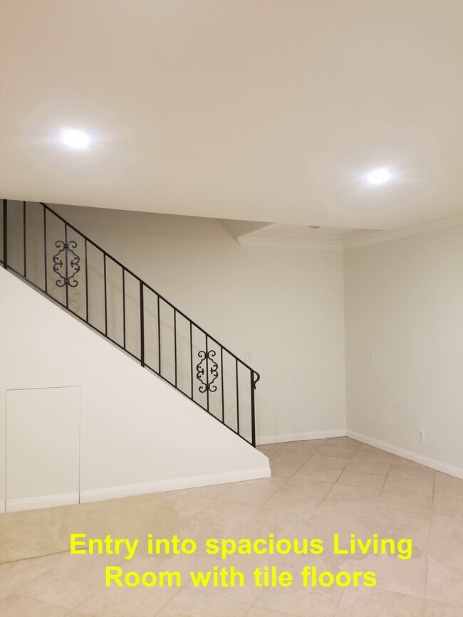 Entry into the spacious living room with tile floors - 4100 Patrice Rd