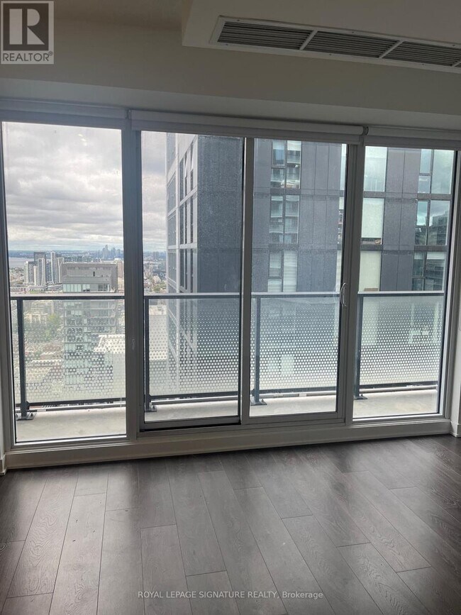 Building Photo - 115-4115 Blue Jays Way