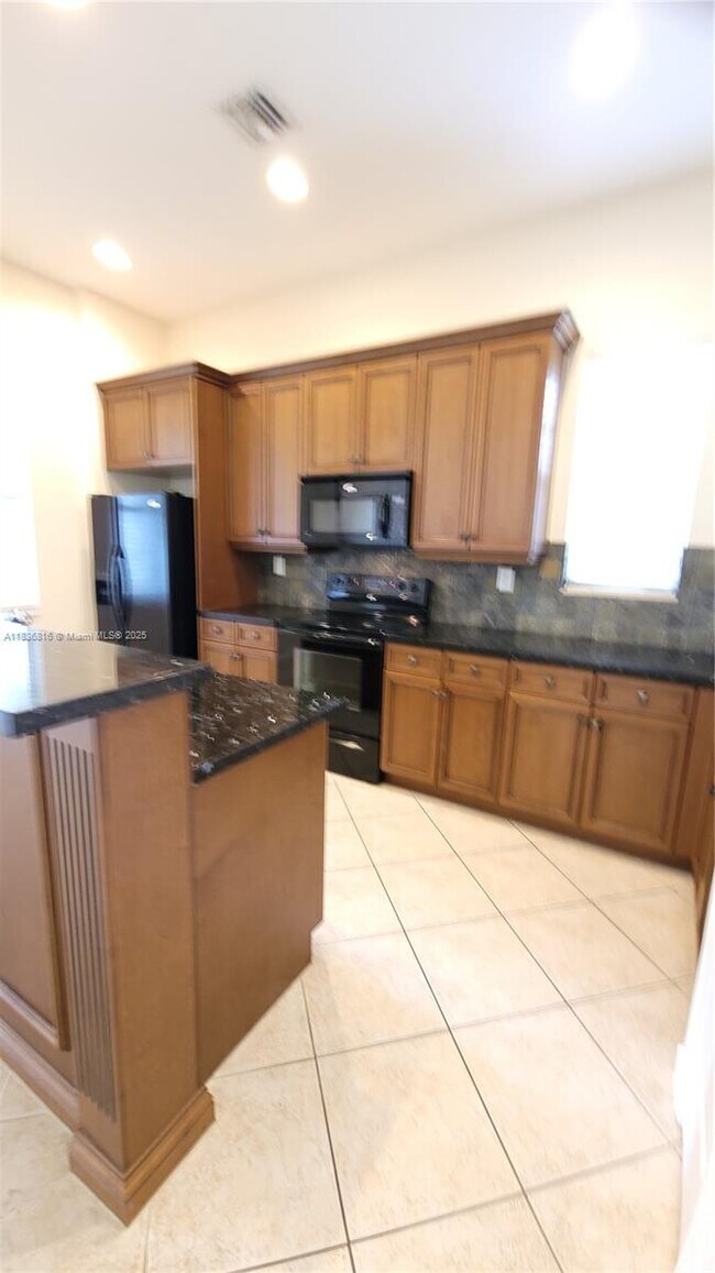 Building Photo - 6033 NW 118th Dr