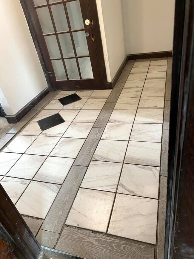 Entrance at top of stairs - 1173 W Pleasant St