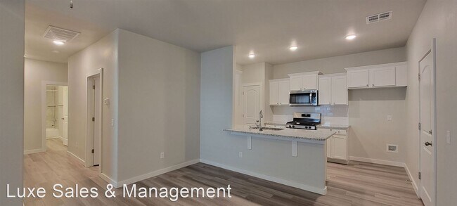 Foto del edificio - 3 br, 2 bath House - 1318 E. Cavanaugh Ave