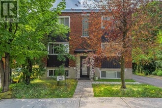 Building Photo - 108-108 Lebrun St