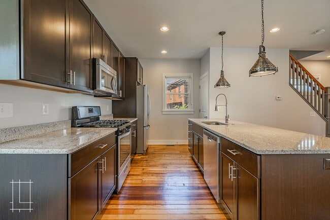 Building Photo - Available Now: One Month Free Rent!