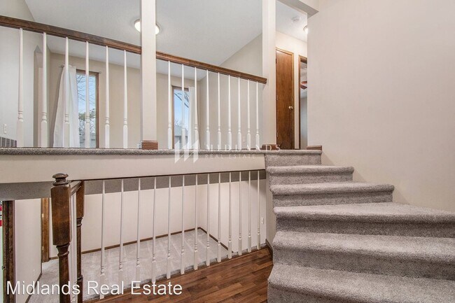 Building Photo - 3 br, 2 bath House - 8410 S 142nd Avenue