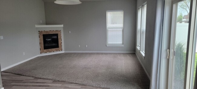 Building Photo - "Luxury Living: Stunning End Unit Townhome...