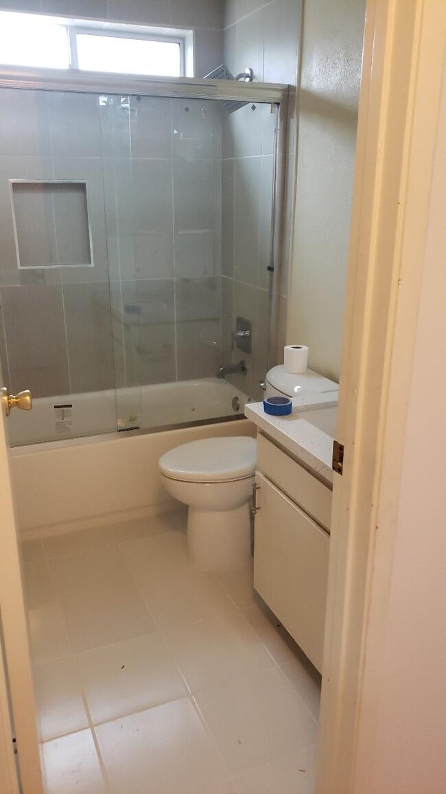 bathroom with tub - 4667 E Mountain View Dr