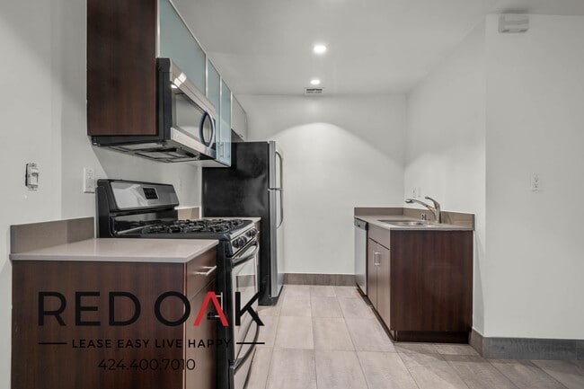 Building Photo - Bright and Inviting One Bedroom with Conte...