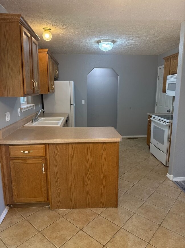 Foto del edificio - 3 bedroom/2 bath house w/ 1 car garage