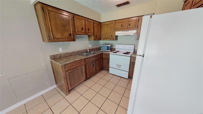Building Photo - 3120 Ravenwood Dr