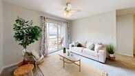 Located at Bristol Lakes in Mount Dora, Florida, this single-story 1-bedroom, 1-bathroom residence offers a well-designed layout that maximizes comfort and functionality. The open-concept living and dining area is bright and welcoming, featuring neutral tones, tile flooring, and a ceiling fan overhead. Large sliding glass doors flood the living room with natural light and provide direct access to a private patio, perfect for enjoying Florida's outdoor lifestyle. The galley-style kitchen is efficiently designed with white cabinetry, dark granite-style countertops, a full suite of white appliances, and tile flooring — offering ample storage and counter space for everyday cooking. The generously sized bedroom is a tranquil retreat, complete with soft carpeting, a ceiling fan, large windows that invite natural light, and access to multiple closets providing excellent storage options. The full bathroom features a combined tub and shower, a single-sink vanity with granite-style countertops, white cabinetry, and tile flooring. A dedicated utility room and hallway add to the home's practicality. The unit's clean, neutral palette and consistent finishes throughout create a cohesive, move-in-ready ambiance ideal for comfortable everyday living.