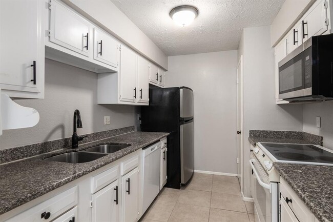 Foto del edificio - 10555 Turtlewood Ct