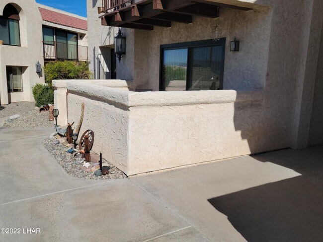 Building Photo - Unfurnished, long term, ground floor unit