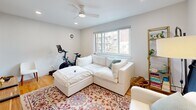 Located at 505 W Melrose St in Chicago's desirable Lakeview neighborhood, this one-bedroom, one-bathroom residence offers a thoughtfully organized single-level layout. The living room is a comfortable, light-filled space anchored by a ceiling fan, recessed lighting, and a large window that frames neighborhood views. Hardwood flooring runs throughout the main living areas, lending warmth and continuity to the space.

The kitchen flows into a dedicated dining area and is complemented by a pantry, providing ample storage and functionality. An entrance area and multiple closets — four in total — ensure excellent organizational capacity throughout the home.

The spacious bedroom features two sets of louvered bi-fold closet doors offering generous storage, hardwood floors, recessed lighting, and wide windows that bring in natural light and treetop views. A baseboard heating system runs along the exterior walls.

The bathroom is clean and bright, finished in white tile with a glass-sliding shower enclosure and modern fixtures. The overall aesthetic throughout the home is crisp and neutral, with white walls and light tones creating a cohesive, airy ambiance. This well-appointed residence delivers efficient, practical living in one of Chicago's most sought-after neighborhoods.