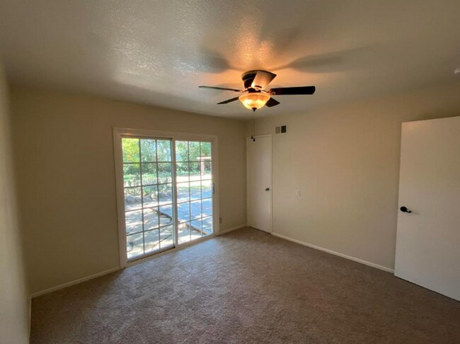 Building Photo - Bright, airy, and nicely laid out 4 Bedroo...