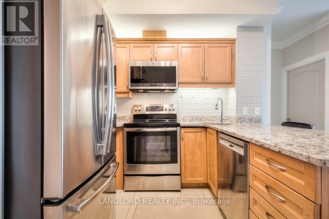 Photo du bâtiment - 3865-3865 Lake Shore Blvd W
