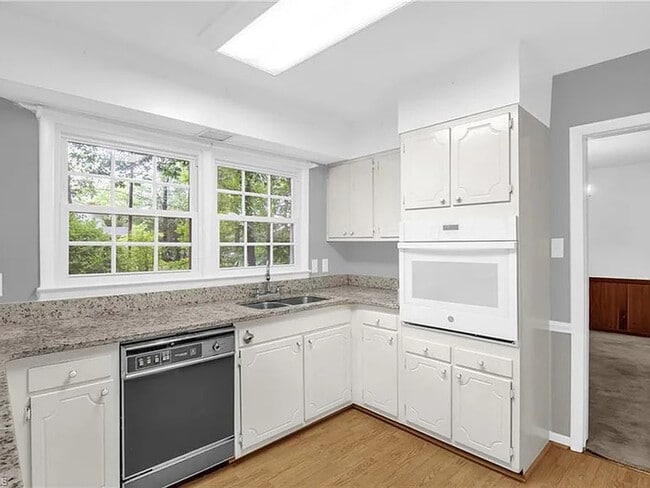 Building Photo - Earn Wealth While Leasing - Like a Homeown...