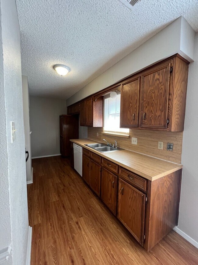 Photo - Spacious 3-Bedroom Duplex with Covered Parking & Fenced Yard! House