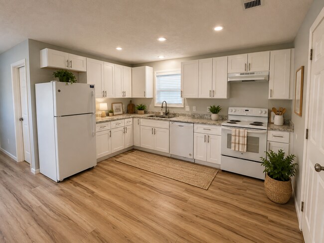 Foto del edificio - This charming 2-bedroom, 2-bath home is conveniently located directly across from East Elementary...