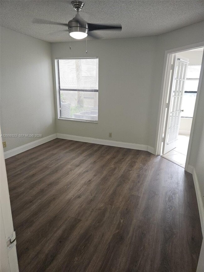 Building Photo - 3200 N Palm Aire Dr
