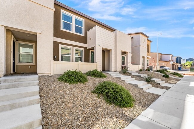Building Photo - Modern West Henderson Townhome with Sleek Upgrades & Smart Home Features!