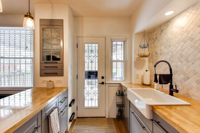 Building Photo - Charming 2 BD + 1 FB brick row house ready to welcome you home!