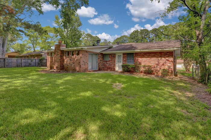 Building Photo - Charming 3-Bedroom, 2-Bathroom Brick Home ...