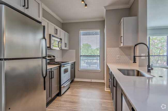 1BR, 1BA - 1005SF A4 - Cocina - Elan at Bluffview