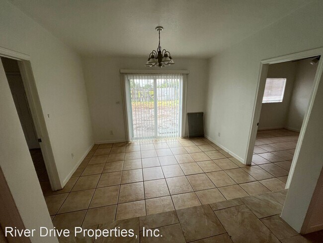 Building Photo - 4 br, 1 bath House - 6169 North Grantland