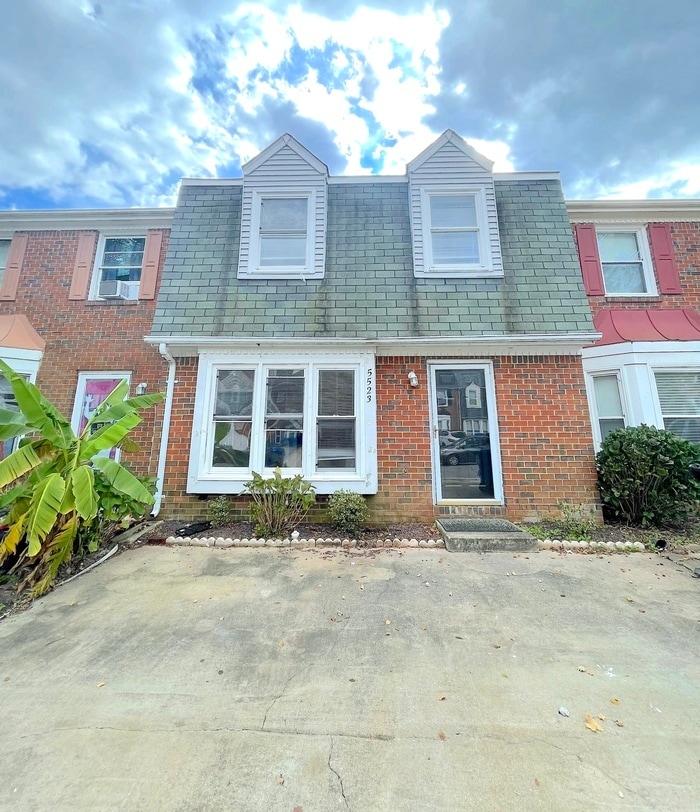 Primary Photo - Charming 3-Bedroom, 1.5-Bathroom Townhome ...