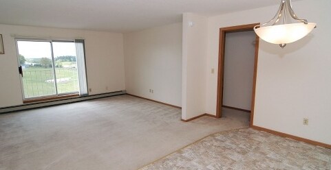 Sala de estar - Geneva Place Apartments