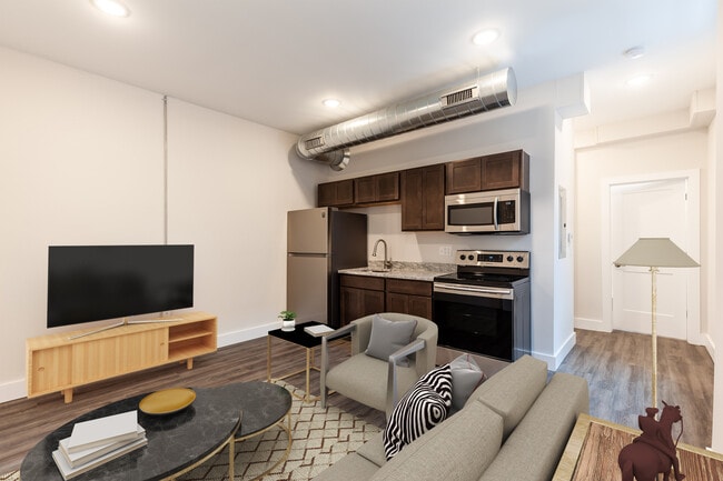 High ceilings and tall windows creates light filled great room - 722 E McMillan St