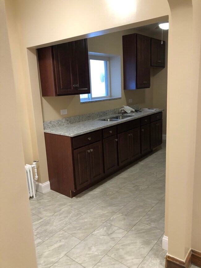 new kitchen with granite countertop - 1648 N Nagle Ave