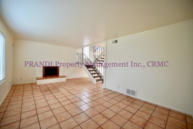 Building Photo - Corner Townhome with A/C and Extra Storage