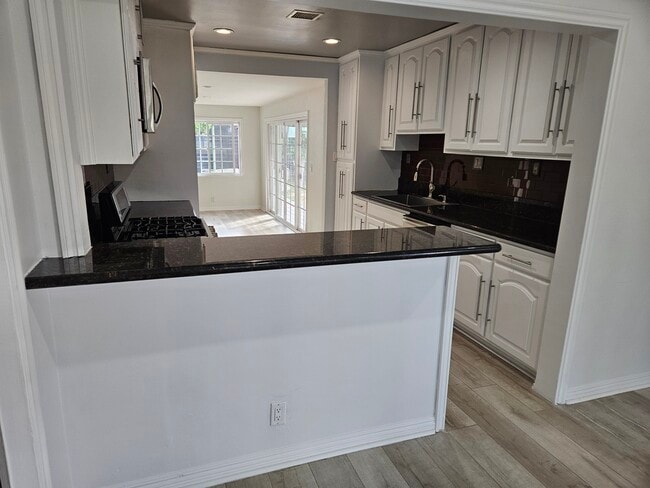 Building Photo - 8030 Lemona Ave