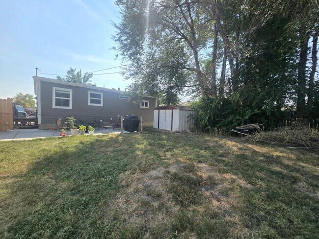 Foto del edificio - Spacious 4 Bedroom Home with Fenced Yard + Pet Friendly! NOT FURNISHED