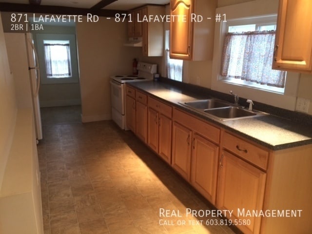 Building Photo - First Floor 2 Bedroom with Heat Included i...