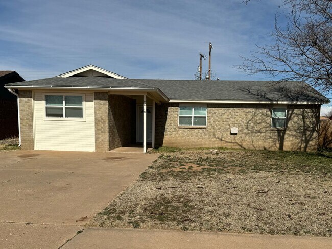 Building Photo - Cute 4-bedroom, 2-bathroom home with all c...