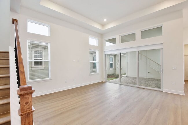 Building Photo - Gorgeous 4/3 Residence with a Private Back Lanai and a 2 Car Garage in the Delightful Laureate Pa...