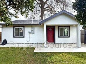 Building Photo - 805 W Yosemite Ave