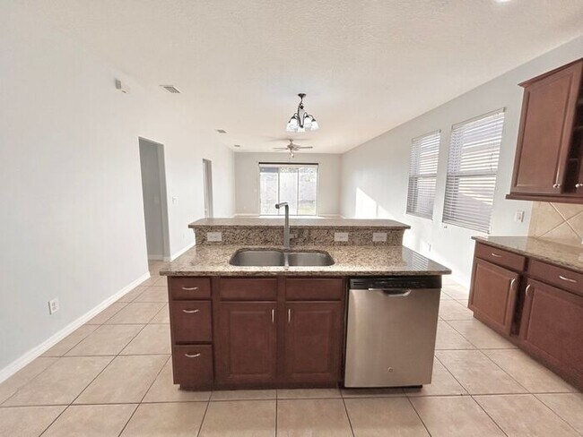 Building Photo - Stylish, Updated 3/2 Home in One of Millennia Park’s Gated Communities! Available Now!